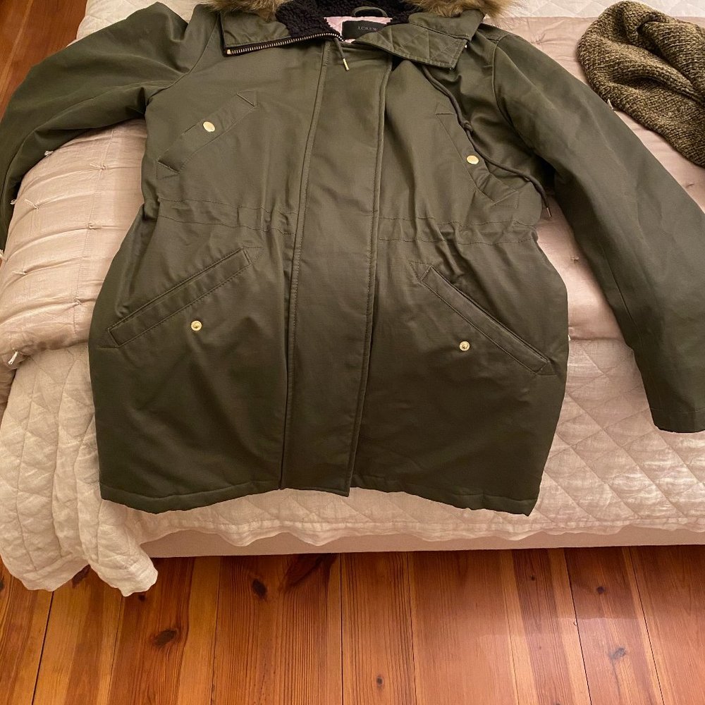 Winter jacket with fuzzy hood